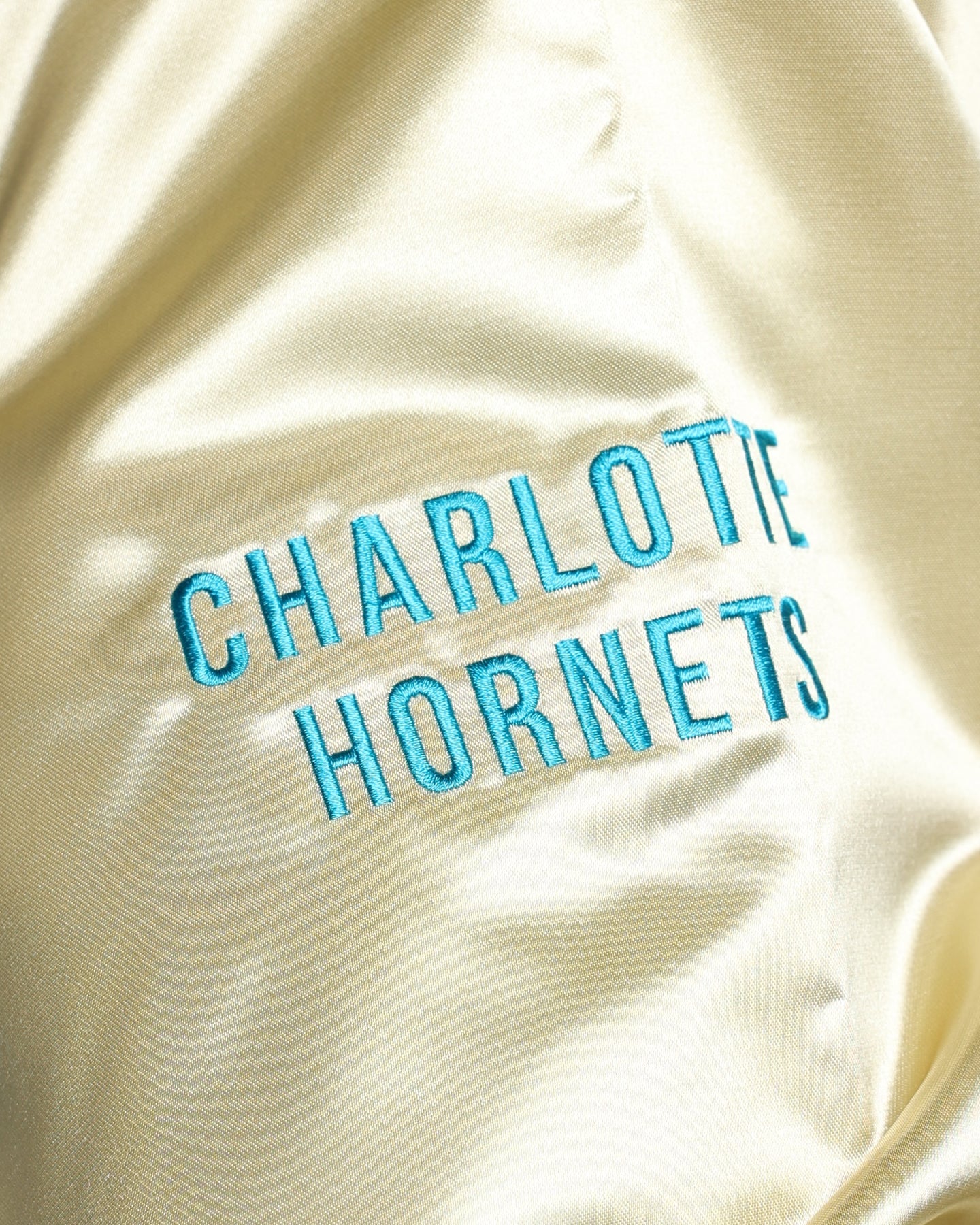 Mitchell & Ness Charlotte Hornets Fashion Lightweight Satin Jacket Light Gold