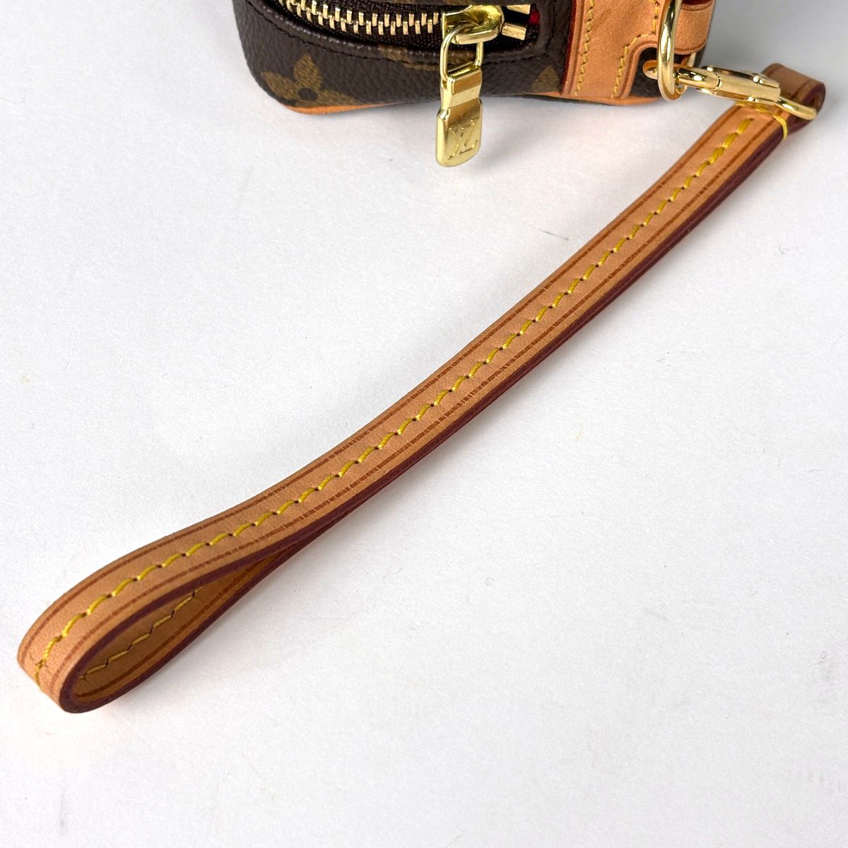 Louis Vuitton Trousse Wapiti Pouch Monogram Brown